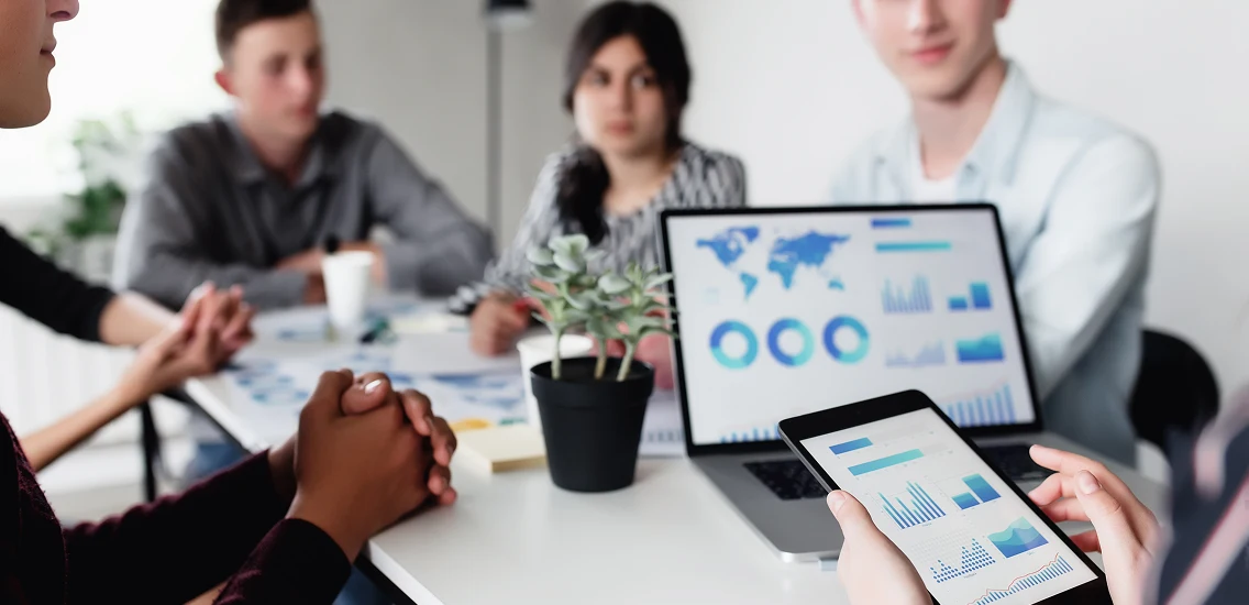 business planning meeting colleagues sitting together